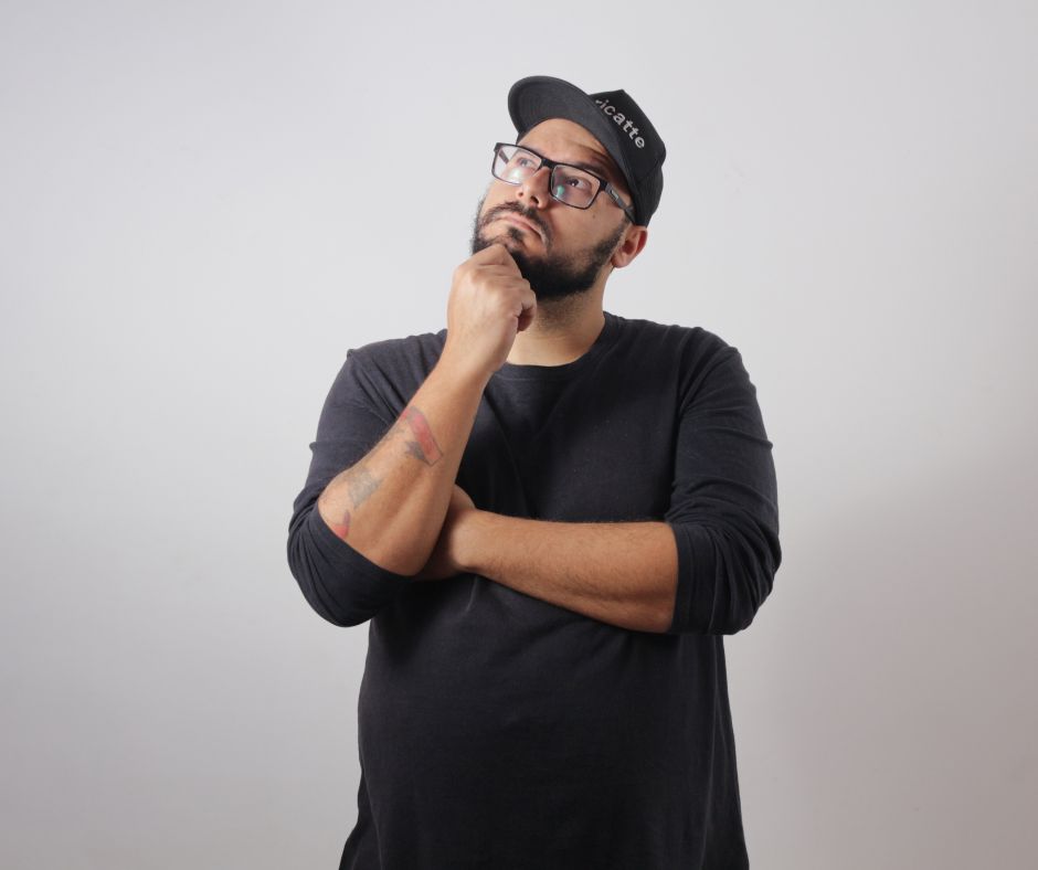 Man thinking what to spend his giftcard on