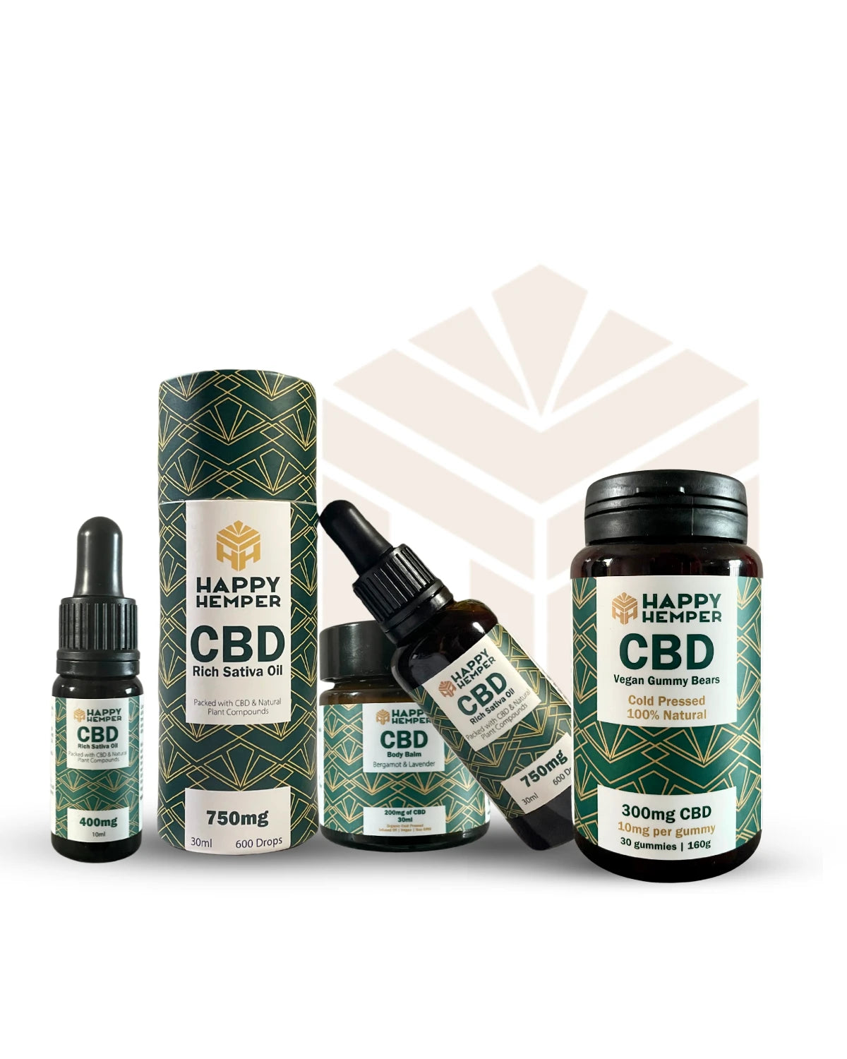 Collection of Happy Hempers CBD products including their CBD oils, gummies and balm, with the Happy Hemper logo in the background | The CBD Hut