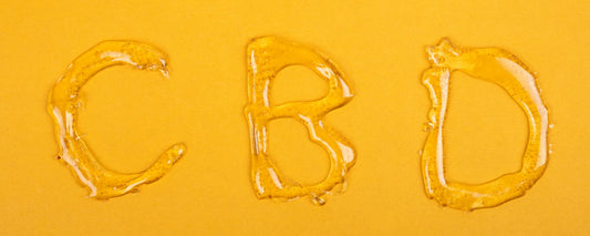 The letters 'CBD' printed in CBD wax