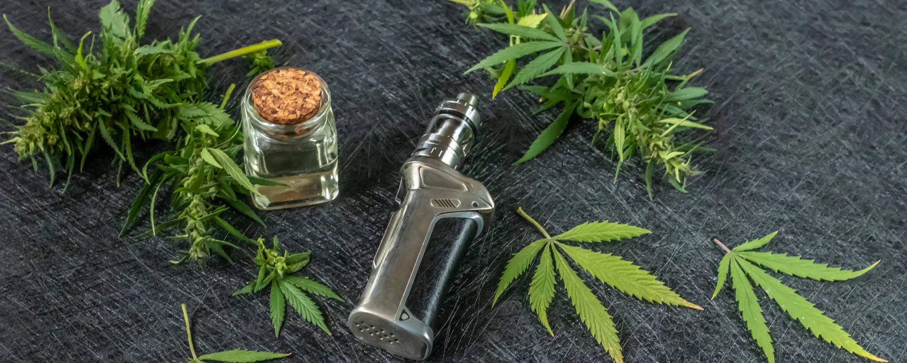 CBD e-liquid on wooden table