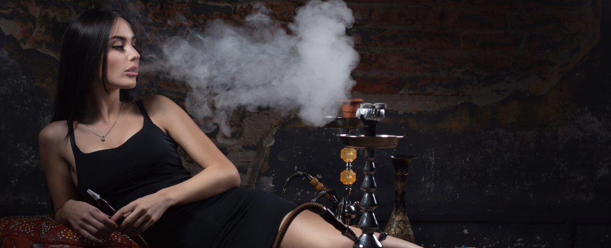 Lady smoking a hookah
