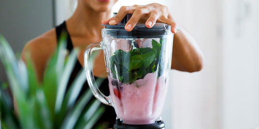 Person blending a smoothie