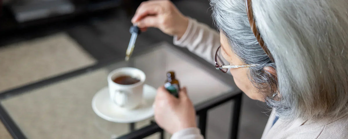 Older adult reviewing CBD product information