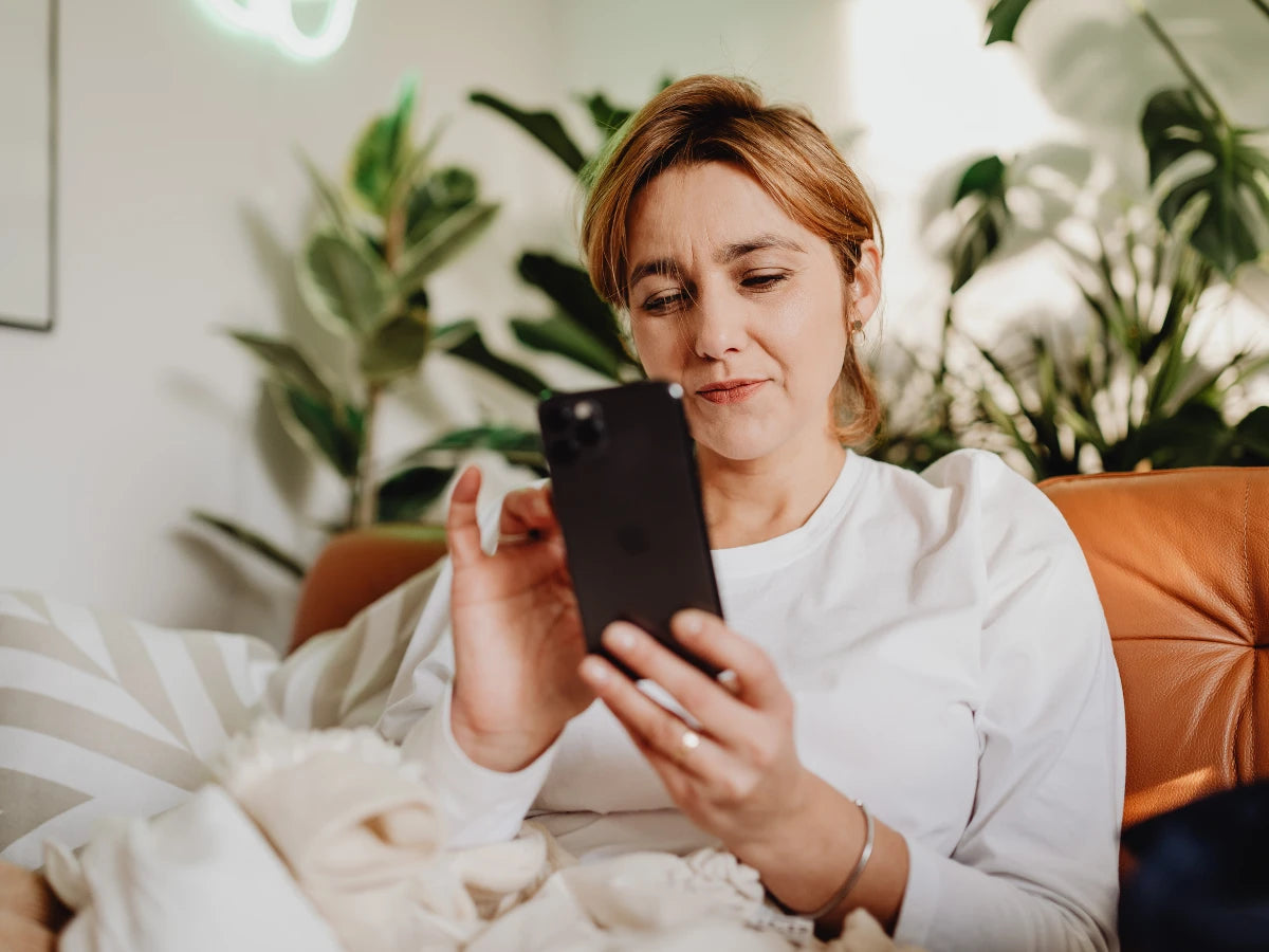 A phone-in-hand lifestyle shot