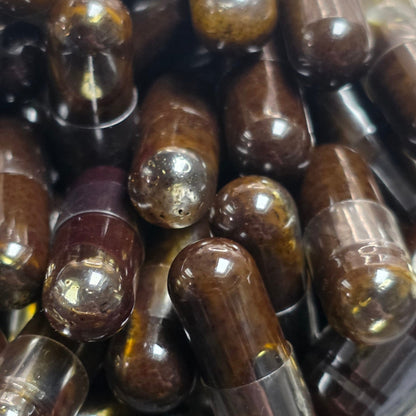 Close-up of Improved Health Jack Frost CBG FECO capsules